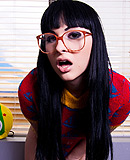 sexy nerd shemale bailey jay with red glasses and open mouth 